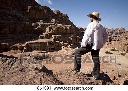 Man Standing Near Monumental Nabataean Tombs View Large Photo Image Stock Image - Man Standing Near Monumental Nabataean Tombs. Fotosearch