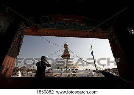 Man Taking A Picture Of Boudhanath Stupa Through A Window View Large Photo Image Stock Image - Man Taking A Picture Of Boudhanath Stupa Through A Window. Fotosearch