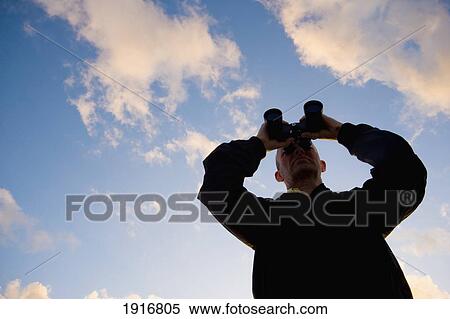 Stock Photography - Man Using Binoculars. Fotosearch