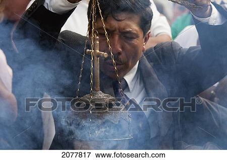 Man Waiving An Incense Burner During The Holy Burial Procession On Good Friday In Antigua Guatemala, Sacatep View Large Photo Image Stock Photo - Man Waiving An Incense Burner During The Holy Burial Procession On Good Friday In Antigua Guatemala, Sacatep. Fotosearch