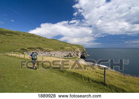 Man Walking Along Coastal Path View Large Photo Image Stock Photo - Man Walking Along Coastal Path. Fotosearch