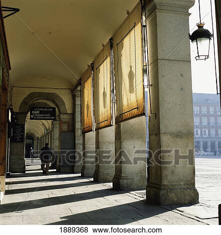 Man Walking Beside Colonnade In Plaza Major View Large Photo Image Stock Photo - Man Walking Beside Colonnade In Plaza Major. Fotosearch