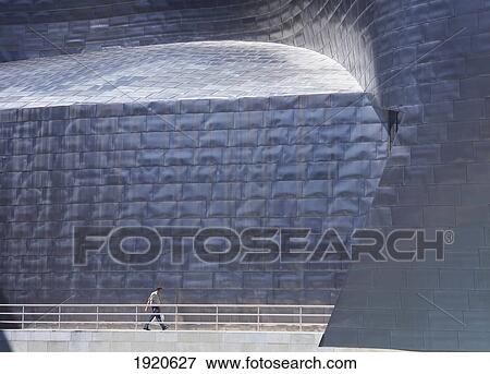 Man Walking By Guggenheim Museum View Large Photo Image Stock Photo - Man Walking By Guggenheim Museum. Fotosearch