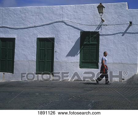 Man Walking Down The Street View Large Photo Image Stock Photograph - Man Walking Down The Street. Fotosearch
