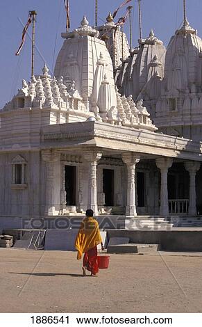Man Walking In Front Of Khodaypul Jain Temple View Large Photo Image Stock Image - Man Walking In Front Of Khodaypul Jain Temple. Fotosearch