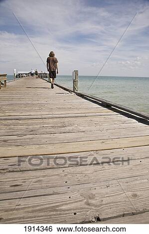 Man Walking On Anna Maria City Pier View Large Photo Image Stock Photograph - Man Walking On Anna Maria City Pier. Fotosearch