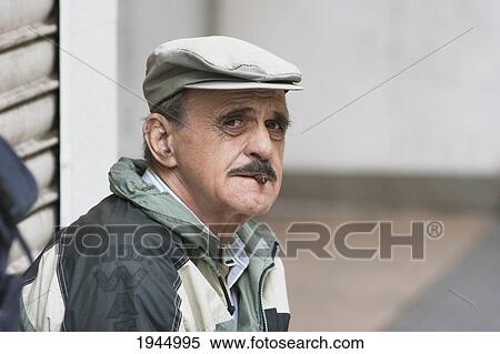 Stock Photography - Man wearing a beret, Buenos Aires, Capital Federal, Argentina. Fotosearch