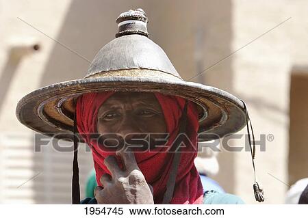 Man wearing a Fulani Straw Hat at Monday Market in Djenne, Mali View Large Photo Image Stock Photography - Man wearing a Fulani Straw Hat at Monday Market in Djenne, Mali. Fotosearch