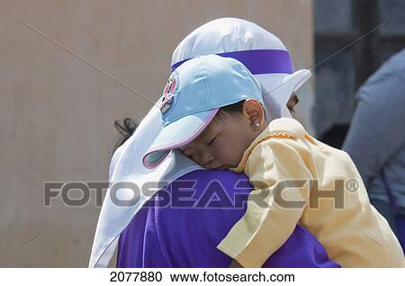 Man Wearing Purple As A Sign Of Mourning Carrying His Sleeping Girl At The Procession Of The Holy Cross On Good Friday In Antigua Guatemala, Sacatep View Large Photo Image Stock Image - Man Wearing Purple As A Sign Of Mourning Carrying His Sleeping Girl At The Procession Of The Holy Cross On Good Friday In Antigua Guatemala, Sacatep. Fotosearch