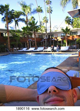 Man With Eye Mask On By Pool View Large Photo Image Stock Photograph - Man With Eye Mask On By Pool. Fotosearch
