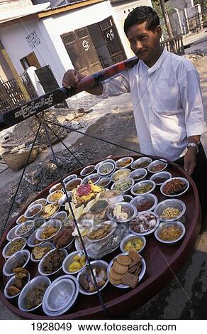 Man With Tray; Mandalay, Myanmar (Burma) View Large Photo Image Stock Photo - Man With Tray; Mandalay, Myanmar (Burma). Fotosearch
