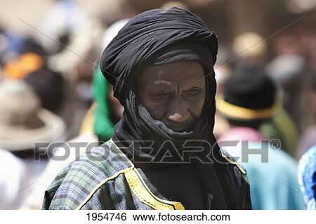 Man with turban at the Monday Market in Djenne, Mali View Large Photo Image Stock Photograph - Man with turban at the Monday Market in Djenne, Mali. Fotosearch