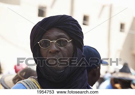Man with turban at the Monday Market, Djenne, Mali View Large Photo Image Stock Image - Man with turban at the Monday Market, Djenne, Mali. Fotosearch