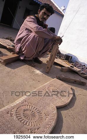 Man Woodworking At Ludia Harijan Village, North Of Bhuj View Large Photo Image Picture - Man Woodworking At Ludia Harijan Village, North Of Bhuj. Fotosearch