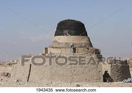 Stock Photography - Man Working On A Brick Kiln In The Outskirts Of Kabul,, Afghanistan. Fotosearch
