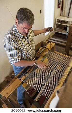 Man Working On Loom Demonstration At Ortega's Weaving Shop, New Mexico, Usa View Large Photo Image Stock Image - Man Working On Loom Demonstration At Ortega's Weaving Shop, New Mexico, Usa. Fotosearch