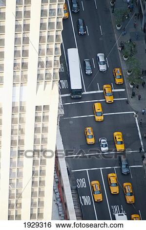 Manhattan Avenue and taxis as seen from the top of the Empire State Building; New York City, New York, United States of America View Large Photo Image Stock Photograph - Manhattan Avenue and taxis as seen from the top of the Empire State Building; New York City, New York, United States of America. Fotosearch