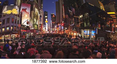 Stock Image - Manhattan, New York City, New York, United States Of America; Crowd Gathering For New Years Eve Celebration At Times Square. Fotosearch