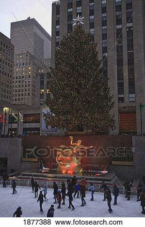 Stock Photo - Manhattan, New York City, New York, United States Of America; Skaters On The Ice Rink In Rockefeller Center. Fotosearch