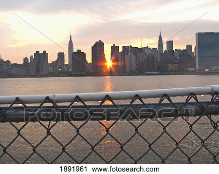 Stock Image - Manhattan Skyline At Sunset, New York City, New York State, Usa. Fotosearch
