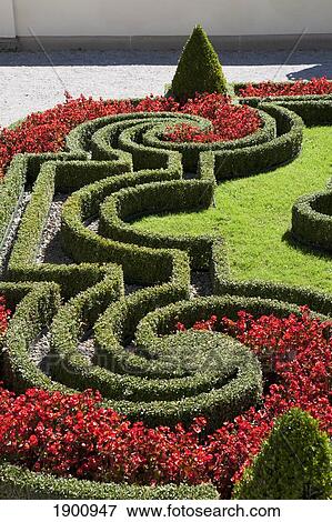 Manicured Hedges And Shrubs With Flowers In A Garden; Linderhof, Germany View Large Photo Image Stock Photo - Manicured Hedges And Shrubs With Flowers In A Garden; Linderhof, Germany. Fotosearch