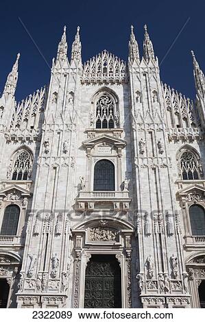 Marble facade of cathedral with blue sky; Milano, Lombardia, Italy View Large Photo Image Stock Photo - Marble facade of cathedral with blue sky; Milano, Lombardia, Italy. Fotosearch