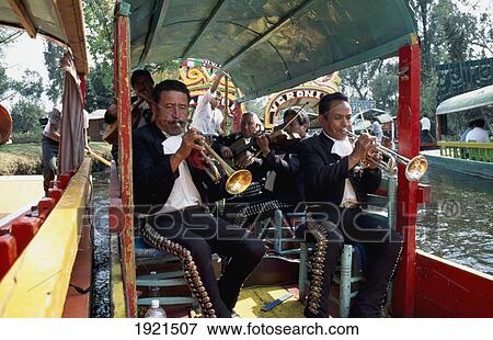 Stock Photo - Mariachi Band On Colourful Punts. Fotosearch