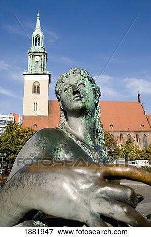 Marienkirche Church, And A Female Statue View Large Photo Image Stock Photo - Marienkirche Church, And A Female Statue. Fotosearch