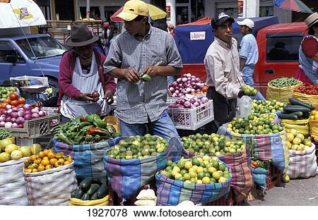 Market Vendors Selling Fresh Fruits And Vegetables On Local Produce Market View Large Photo Image Stock Photo - Market Vendors Selling Fresh Fruits And Vegetables On Local Produce Market. Fotosearch