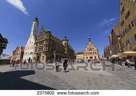 Stock Image - Marktplatz and Rathaus (Town Hall), Rothenburg-ob-der-Tauber, Bavaria, Germany. Fotosearch