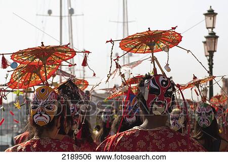 Masked Performers With Umbrellas In Venice, Italy View Large Photo Image Stock Photograph - Masked Performers With Umbrellas In Venice, Italy. Fotosearch