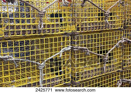 Stock Image - Massachusetts, Rockport, A close up view of lobster pots.. Fotosearch