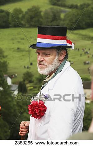 Stock Photography - Master of ceremonies at the Cheese Rolling at Coopers Hill; Brockworth, Gloucestershire, England. Fotosearch