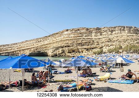 Stock Photo - Matala beach; Crete, Greece. Fotosearch