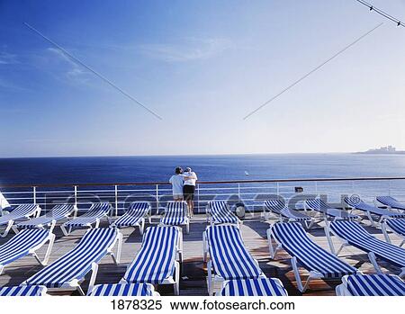 Stock Photography - Mature Couple Hugging On The Desks Of Cruise Ship Off Bahamas. Fotosearch