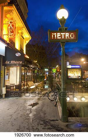 Stock Image - Maubert-Mutualite Metro Station And Cafe At Dawn In The Latin Quarter (Quartier Latin) On The Left Bank, Paris, France. Fotosearch
