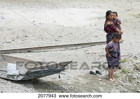 Stock Image - Maya Girls On The Shores Of Lake Atitlan, Santa Catarina Palopo, Solol. Fotosearch