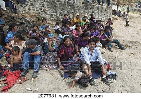 Stock Image - Maya People By The Shores Of Lake Atitlan On Easter Sunday, Panajachel, Solol. Fotosearch