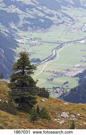 Stock Image - Mayrhofen, Tyrol, Austria; View Of The Town From A Mountain. Fotosearch