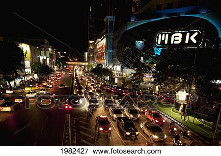 Stock Photo - Mbk Centre And Traffic At Night; Bangkok Thailand. Fotosearch