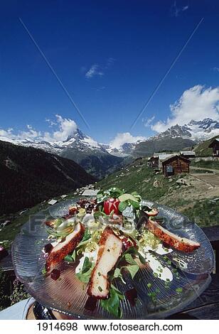 Stock Photo - Meal On Plate At Mountain Restaurant. Fotosearch