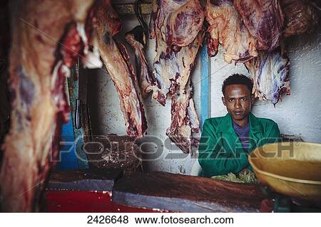 Meat on sale at a butchers in the city of Harar in Eastern Ethiopia; Harar, Ethiopia View Large Photo Image Stock Photo - Meat on sale at a butchers in the city of Harar in Eastern Ethiopia; Harar, Ethiopia. Fotosearch