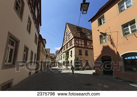 Medieval street scene, Rothenburg-ob-der-Tauber, Bavaria, Germany View Large Photo Image Stock Photo - Medieval street scene, Rothenburg-ob-der-Tauber, Bavaria, Germany. Fotosearch