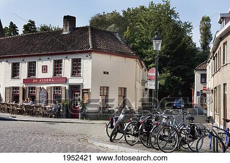 Stock Image - Medieval white-washed house, Bruges (Brugge), West Flanders, Belgium. Fotosearch