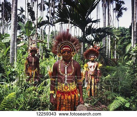 Stock Image - Mekeo tribesmen in traditional attire; Central Province, Papua New Guinea. Fotosearch