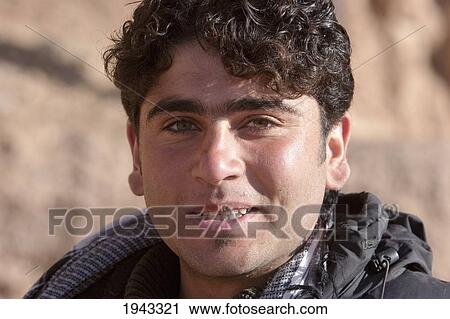 Stock Image - Member Of An Archaeological Team Working On The Restoration Of The Cliffs At Bamiyan, Bamian Province, Afghanistan. Fotosearch