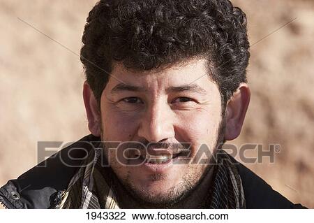 Stock Image - Member Of An Archaeological Team Working On The Restoration Of The Cliffs At Bamiyan, Bamian Province, Afghanistan. Fotosearch