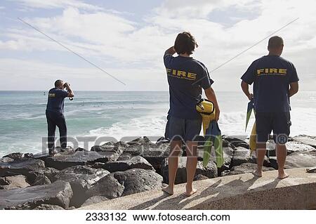 Members of the Honolulu Fire Department are called out to the beach for search and rescue mission; Honolulu, Oahu, Hawaii, United States of America View Large Photo Image Stock Image - Members of the Honolulu Fire Department are called out to the beach for search and rescue mission; Honolulu, Oahu, Hawaii, United States of America. Fotosearch