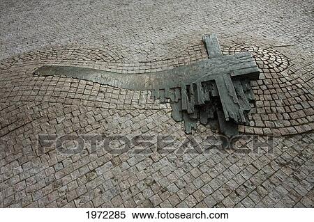 Stock Photography - Memorial Cross On The Place Where Jan Palach Burned Himself Alive On Wenceslas Square, Prague, Czech Republic. Fotosearch