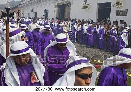Stock Image - Men And Boys Wear Purple As A Sign Of Mourning At The Procession Of The Holy Cross On Good Friday In Antigua Guatemala, Sacatep. Fotosearch
